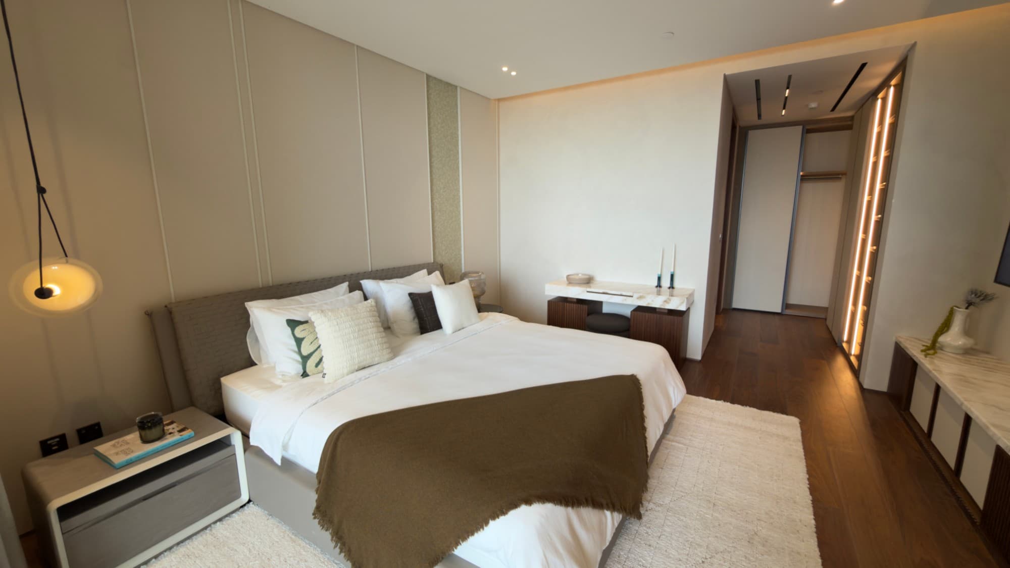 A further bedroom suite, with its dressing area beyond