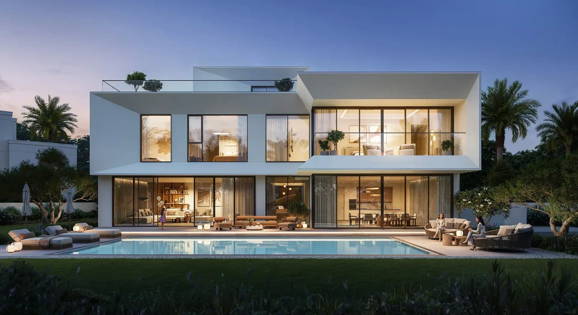 Emaar's render of the villa type, seen from the garden across the pool at dusk